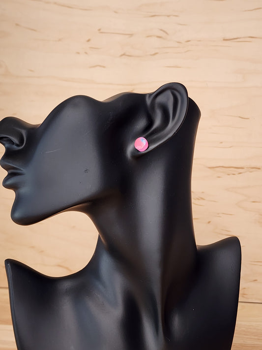 Small pinkish stud