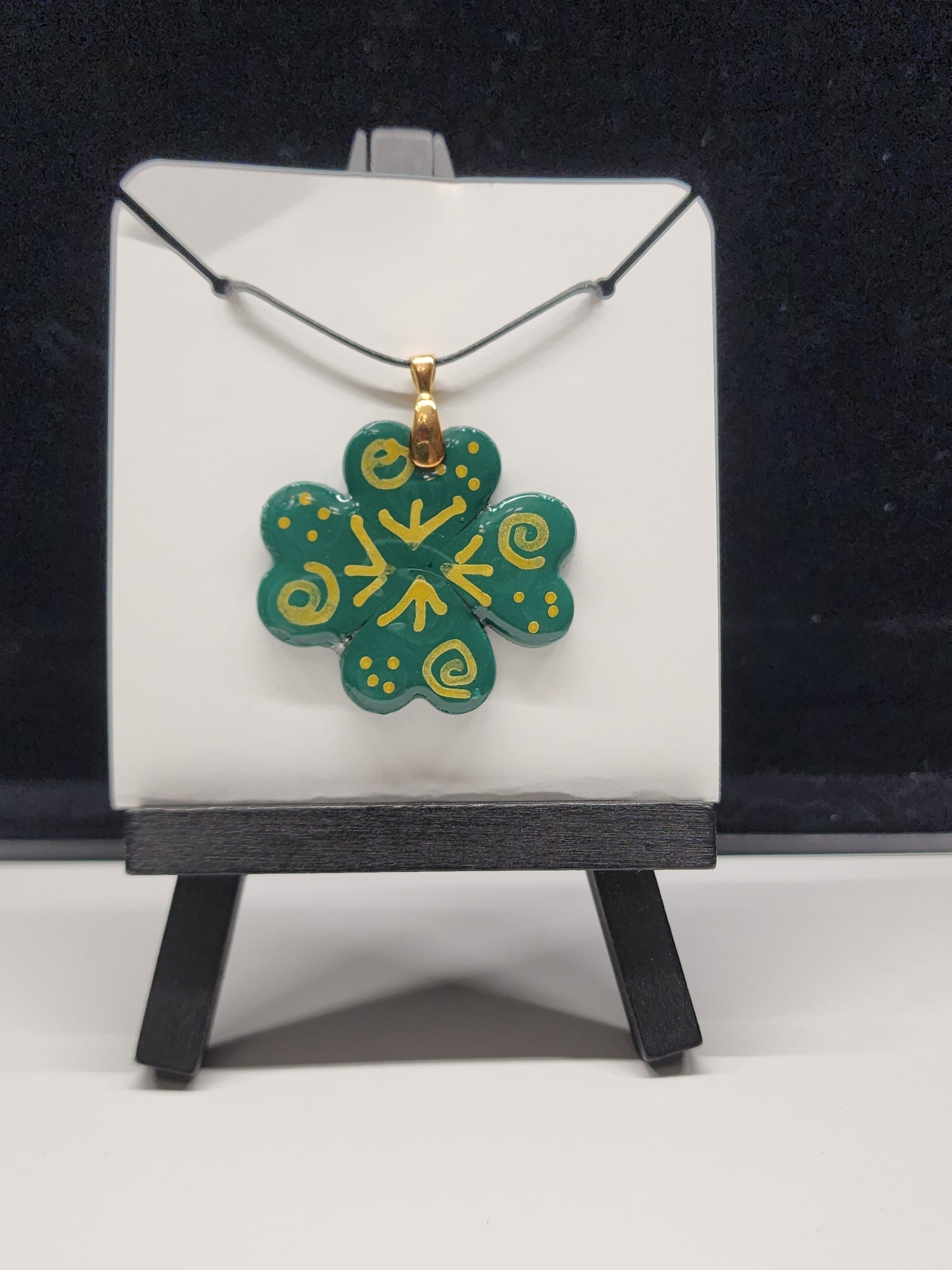 Shamrock pendant with gold